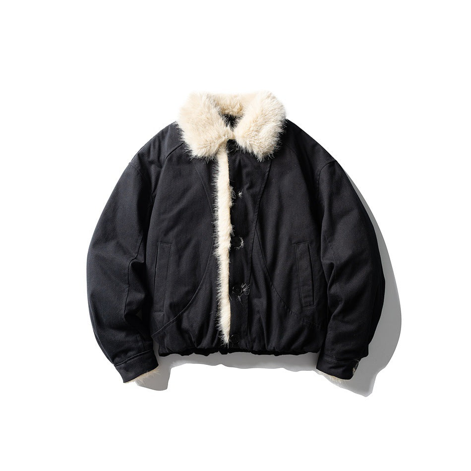 Black button-front jacket with cream fur-style collar and front trim, curved seams and side pockets, laid flat
