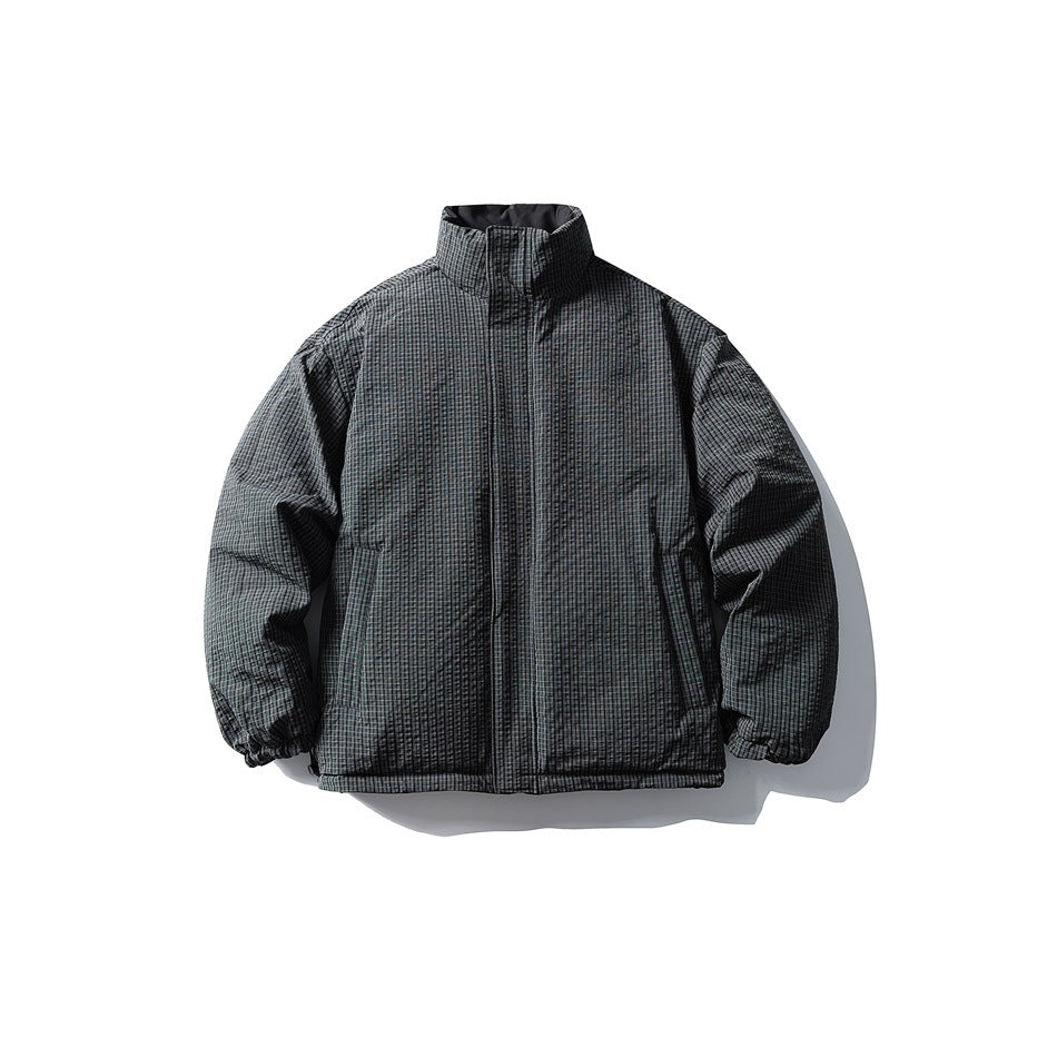Front view of a gray-and-black micro-check jacket with a high collar, front closure, and two side pockets.