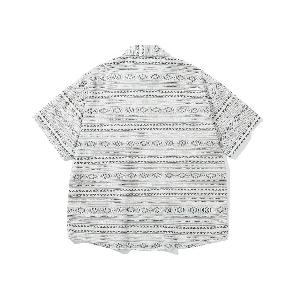 Back view of black and off-white geometric striped short-sleeve shirt with a curved hem