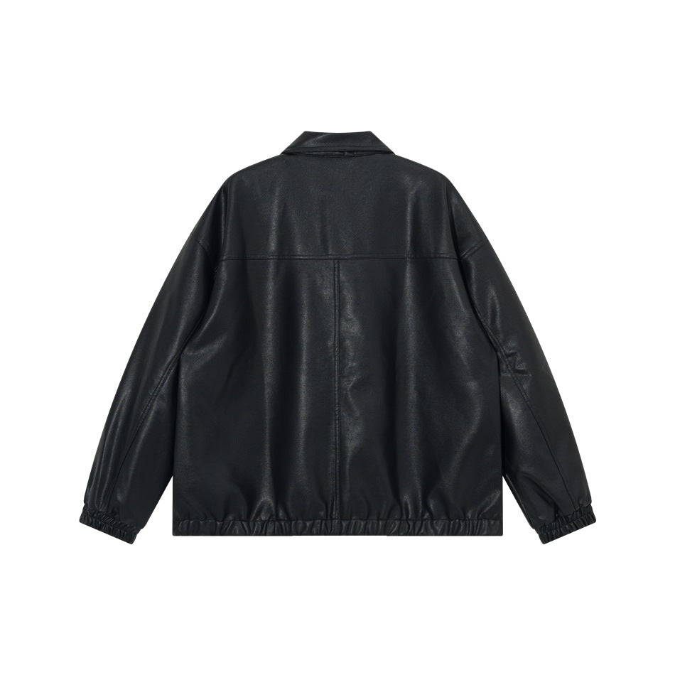 Back view of black faux-leather-look jacket showing yoke seam, center back seam, collar and elastic cuffs and hem