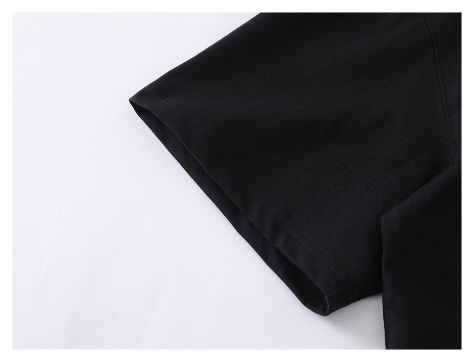 Close-up of the black short sleeve and its stitched hem.