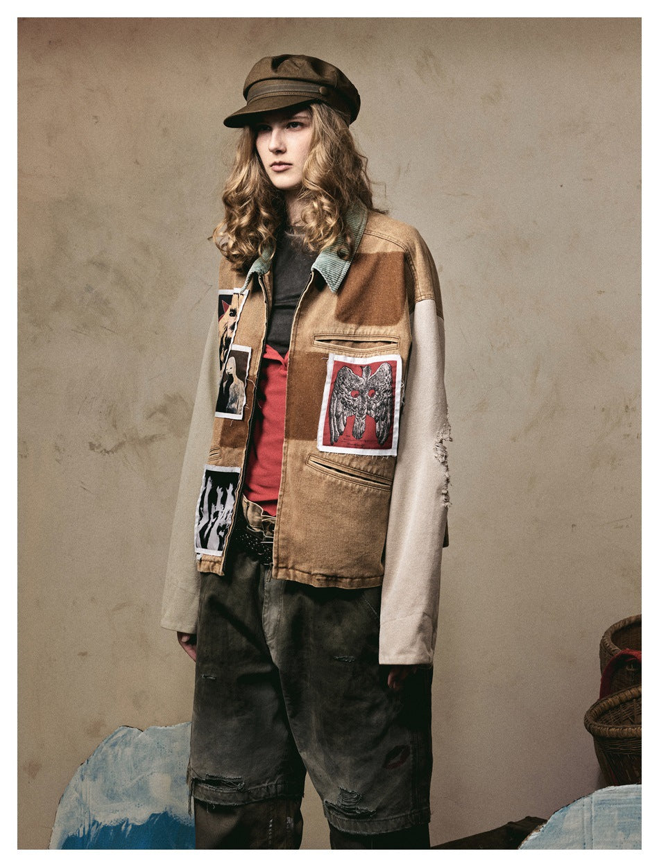 Angled view of a model wearing a brown graphic-patch jacket with pale sleeves and a green striped collar.