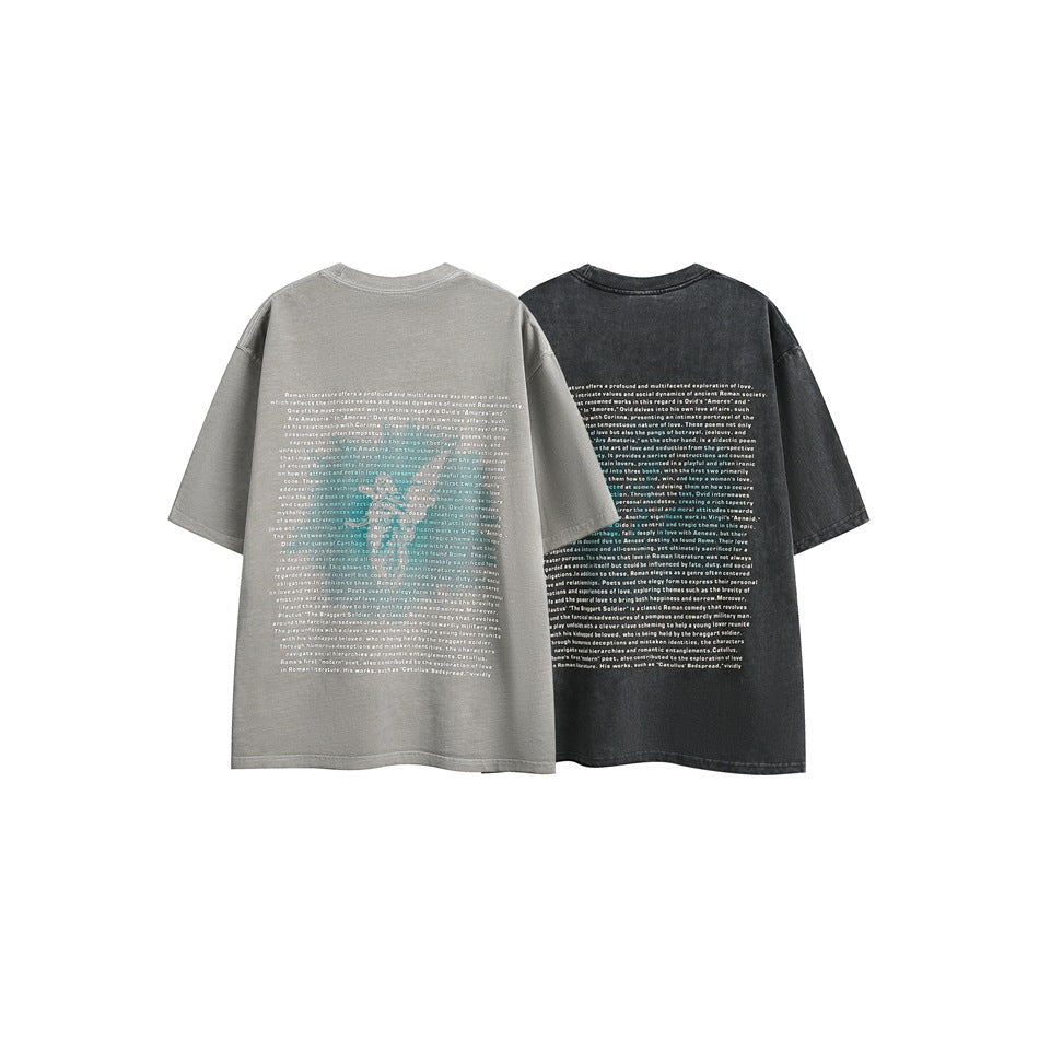 Rear views of oversized T-shirts in light gray and dark charcoal, each printed with a large block of English text.