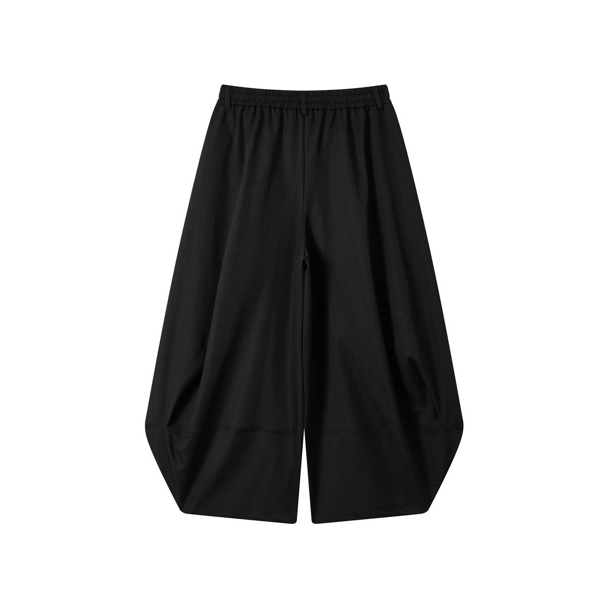 Back view of black wide-leg pants with an elasticized waistband and curved panel seams.