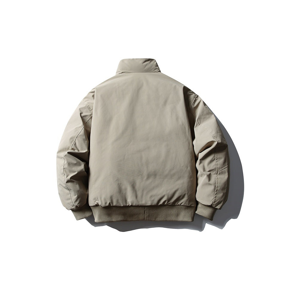 Back view of a taupe jacket with a stand collar, long sleeves, and ribbed cuffs and hem.