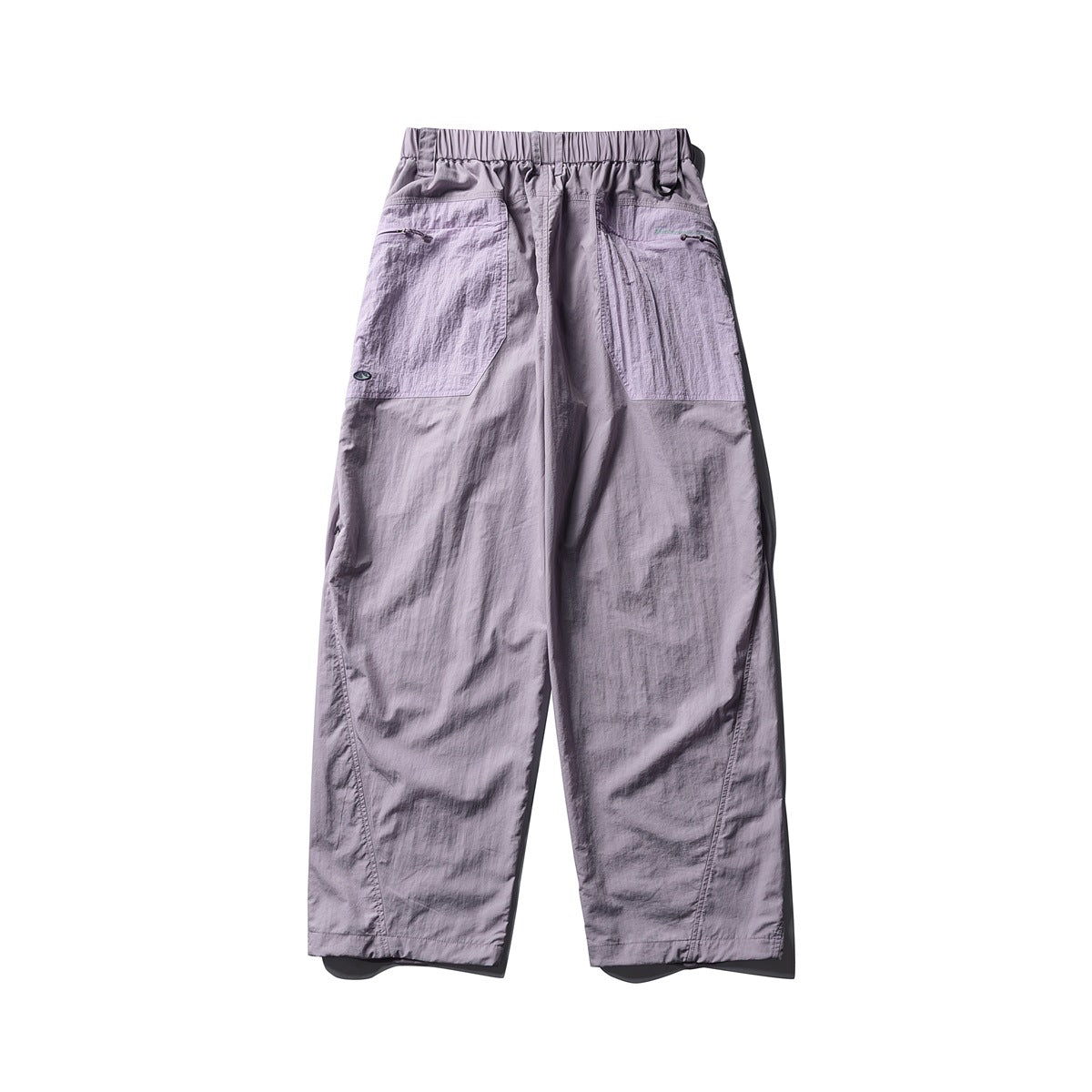Back view of pale lavender pants with an elastic waist, two large patch pockets, and straight legs.