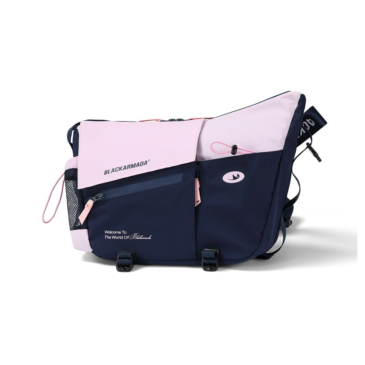 Pink and navy color-block crossbody bag with angled flap, diagonal zip pocket, side mesh pocket and buckles