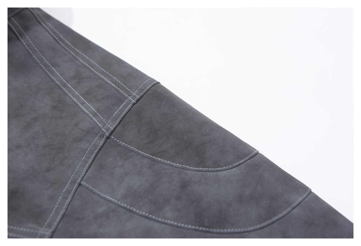 Close-up of curved, stitched panel seams on the jacket sleeve.