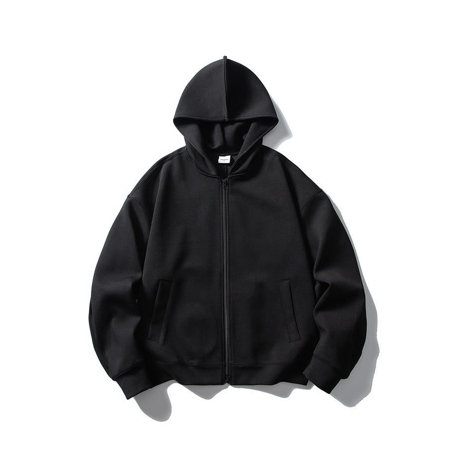 Black zip-up hoodie laid flat, front view, with hood, full zipper and two angled front pockets