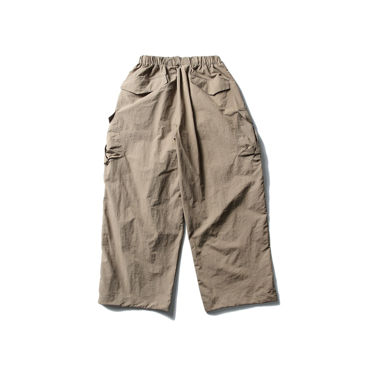 Back view of Khaki wide-leg cargo pants with elastic waistband, back flap pockets and side cargo pockets