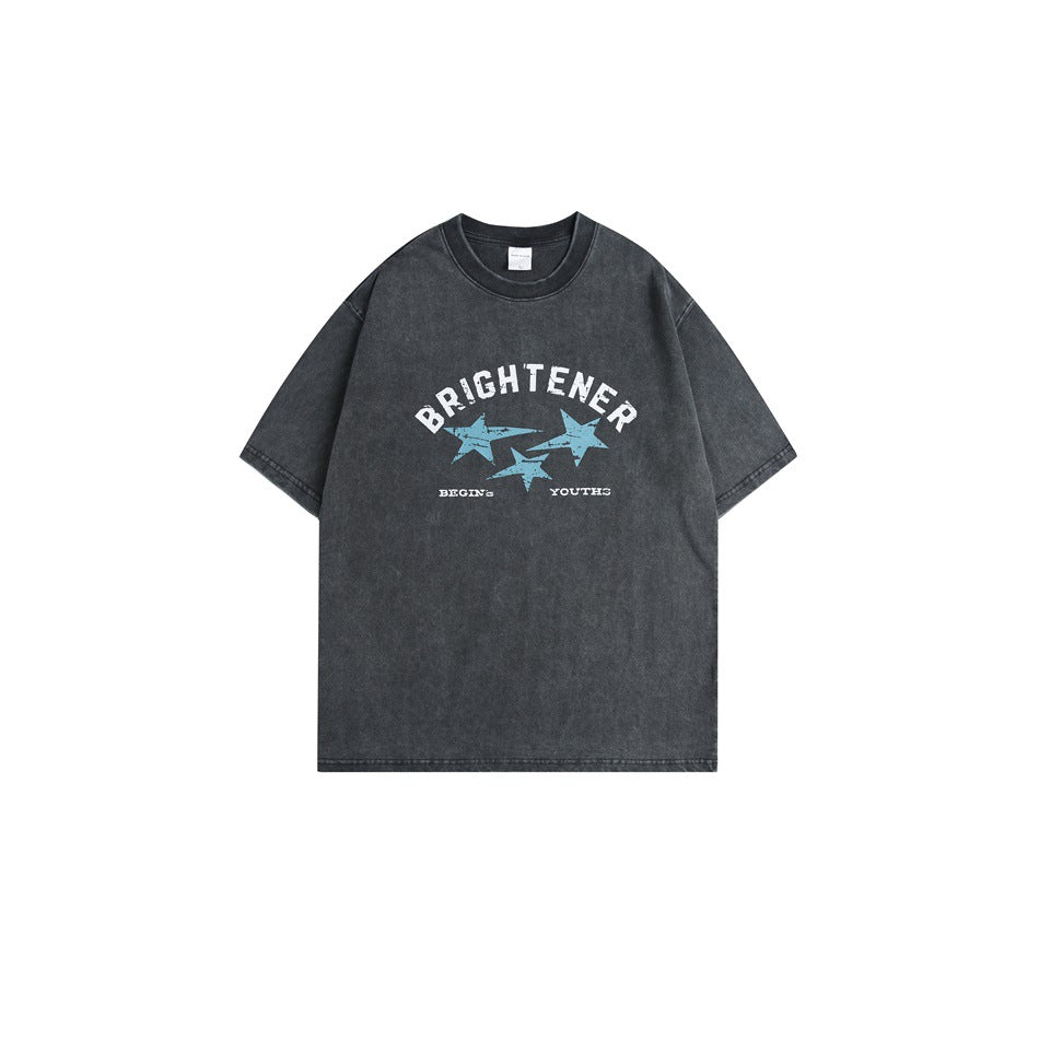 Washed black short-sleeve T-shirt with white BRIGHTENER lettering and three light blue distressed stars