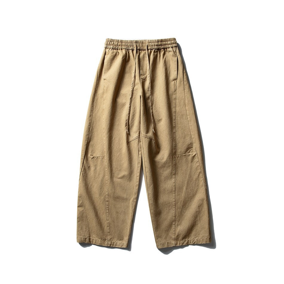 Khaki wide-leg pants with an elastic drawstring waistband, flat lay front view