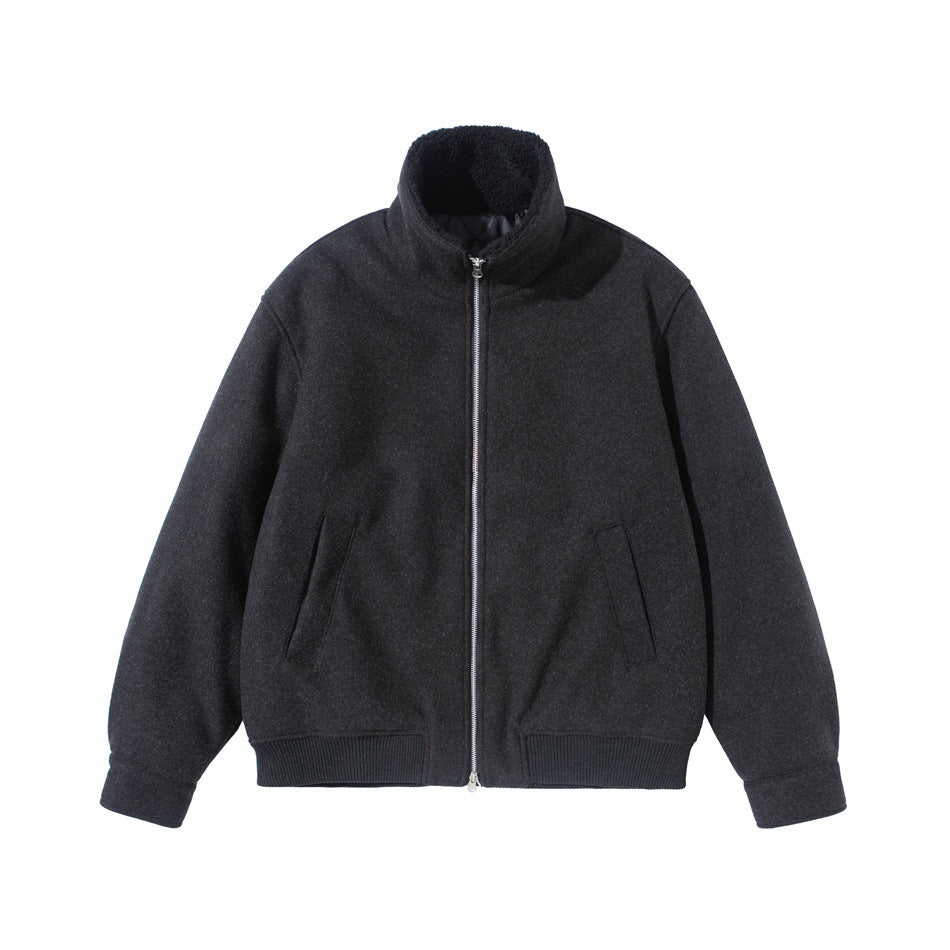 Black charcoal stand-collar zip-up jacket with silver zipper and ribbed hem, front flat lay