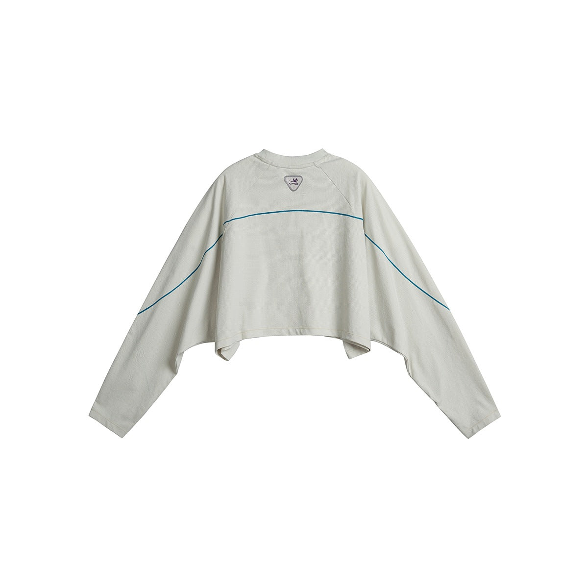 Back view of an ivory cropped long-sleeve top with teal curved seam lines and a small neck emblem.