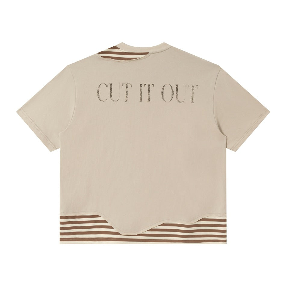 Back of beige-gray T-shirt with distressed CUT IT OUT print and striped wavy hem layer