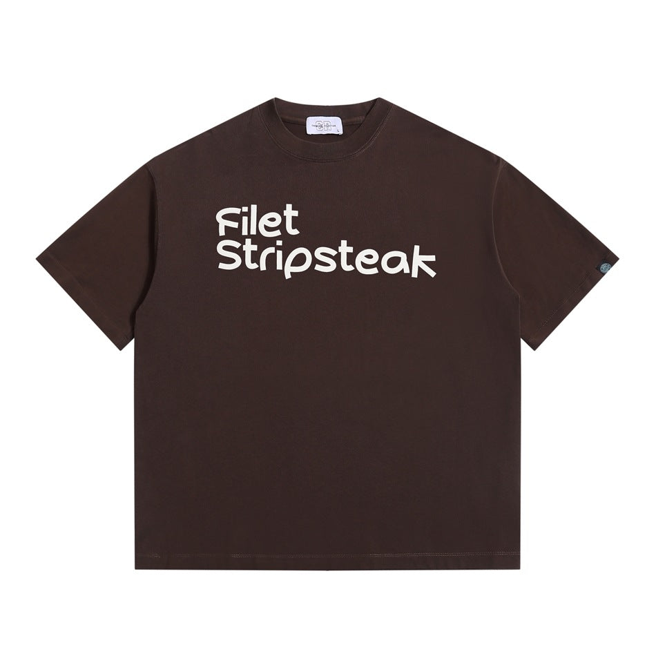 Brown short-sleeve crew-neck T-shirt with large cream "Filet Stripsteak" print, flat lay front view