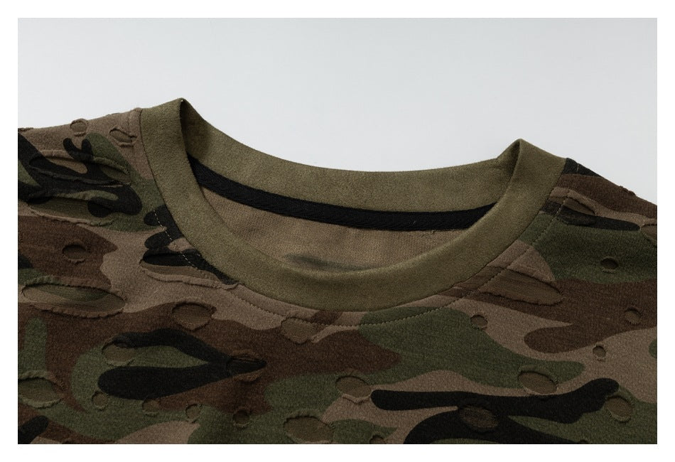 Close-up of the olive crew neck, distressed camouflage fabric, and neckline stitching.