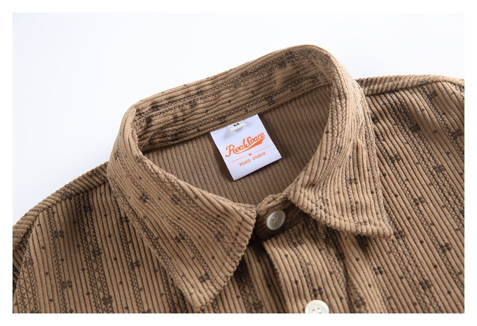 Close-up of the brown shirt's collar, buttons, ribbed texture, and interior brand label.