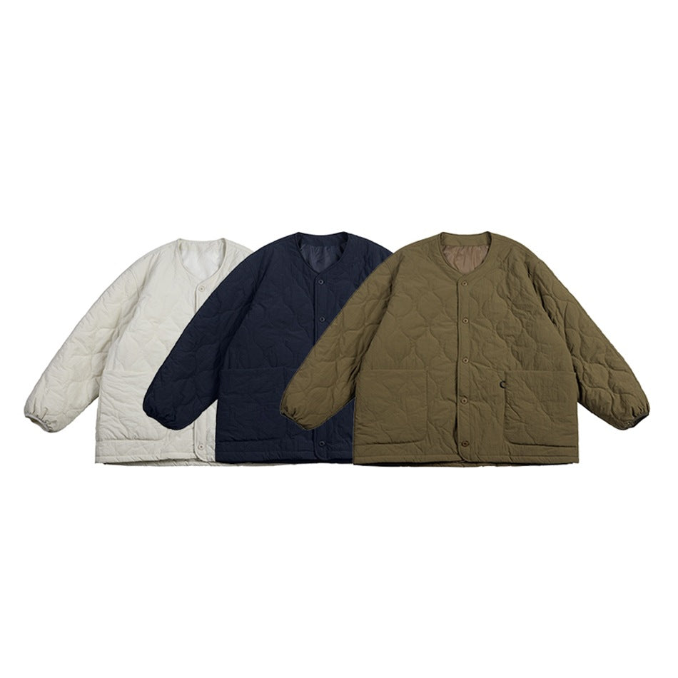 Three quilted button-front jackets shown together in ivory, navy, and olive-brown.