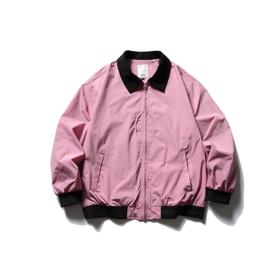 Pink zip-front jacket with black textured collar, black ribbed cuffs and hem, and front pockets, flat lay