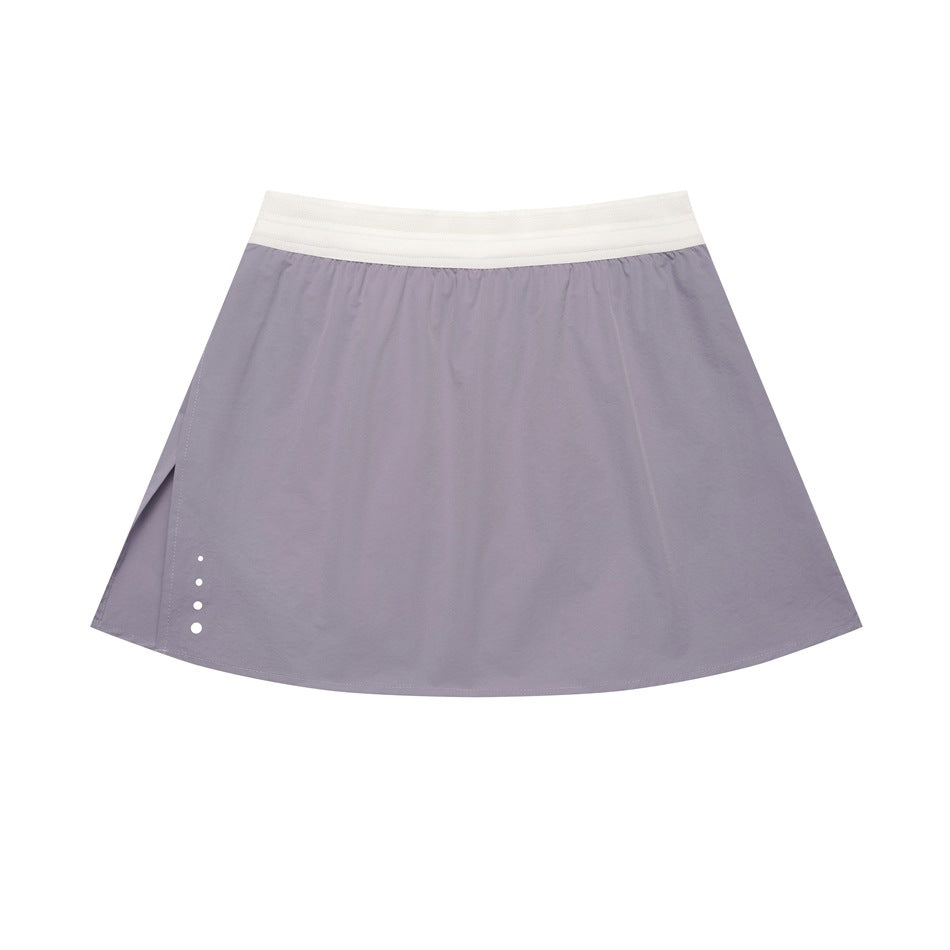 Blue-purple A-line mini skirt with cream elastic waistband, side slit and small dots near the hem