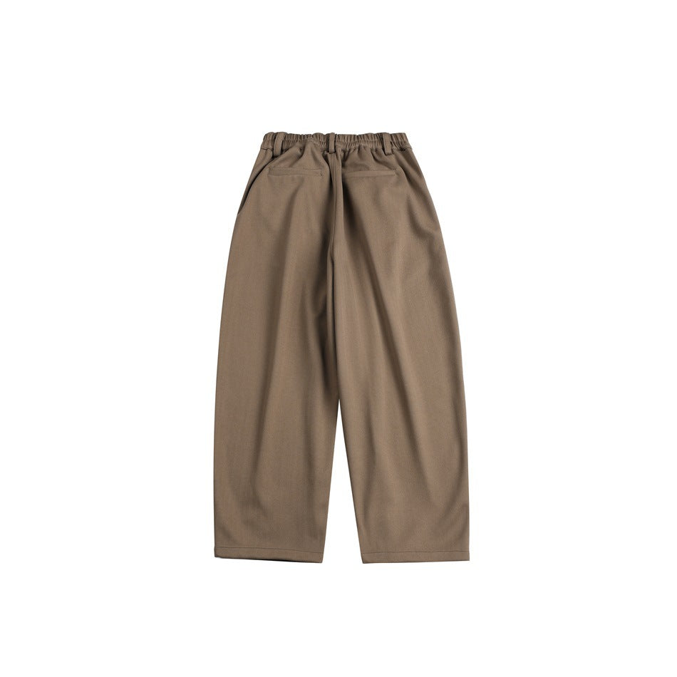 Taupe-brown wide-leg trousers shown from the back, with an elastic waistband and two rear pockets.