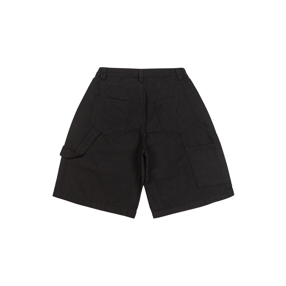 Black knee-length shorts, back flat lay, with two patch pockets and a large side utility pocket
