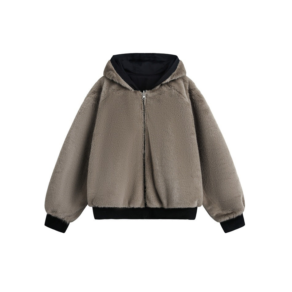 Front view of a gray-taupe fuzzy zip-up jacket with a black-lined hood and black ribbed trim.