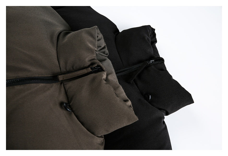 Close-up of brown and black padded jackets showing zippered pockets and sleeve details.