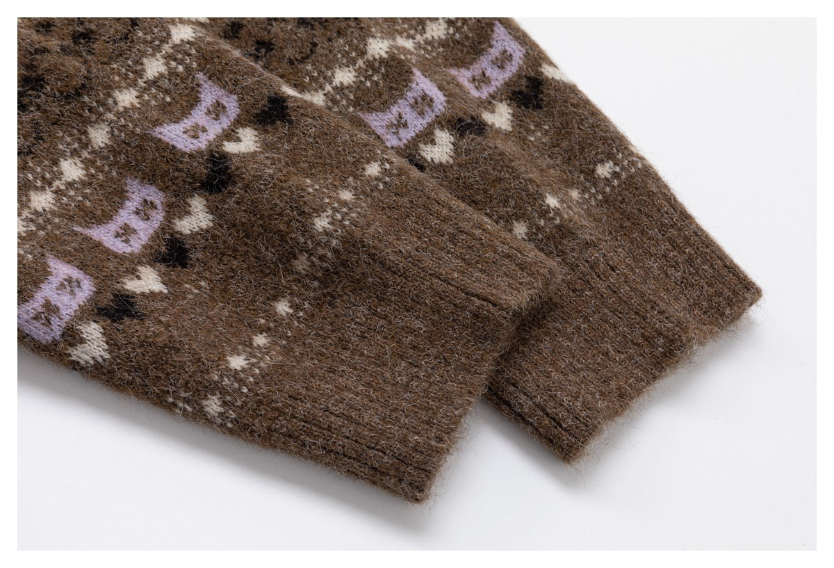Close-up of the brown cardigan's ribbed sleeve cuff and patterned knit.