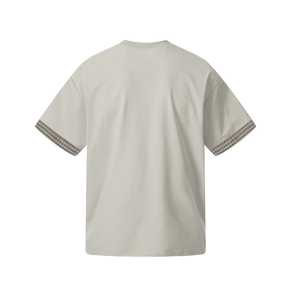 Back view of an off-white short-sleeve T-shirt with checked trim on the sleeve cuffs.