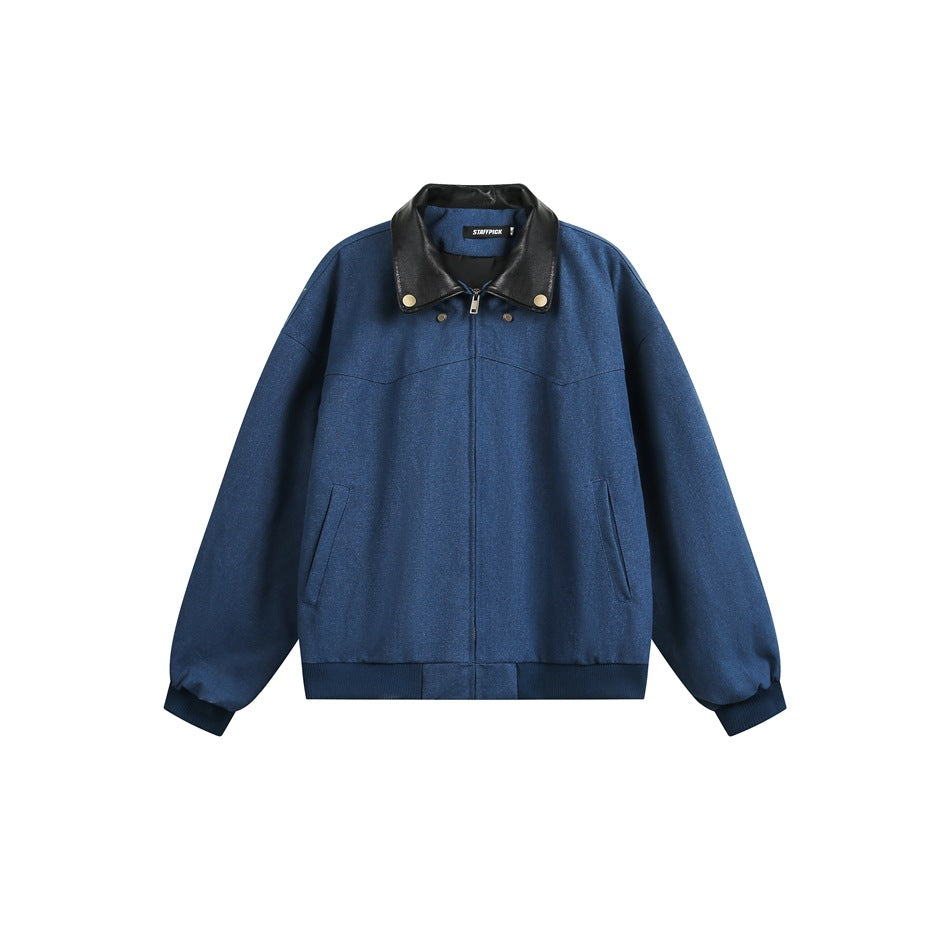 Blue zip-front bomber jacket with black glossy fold-over collar, gold snap buttons and ribbed cuffs and hem