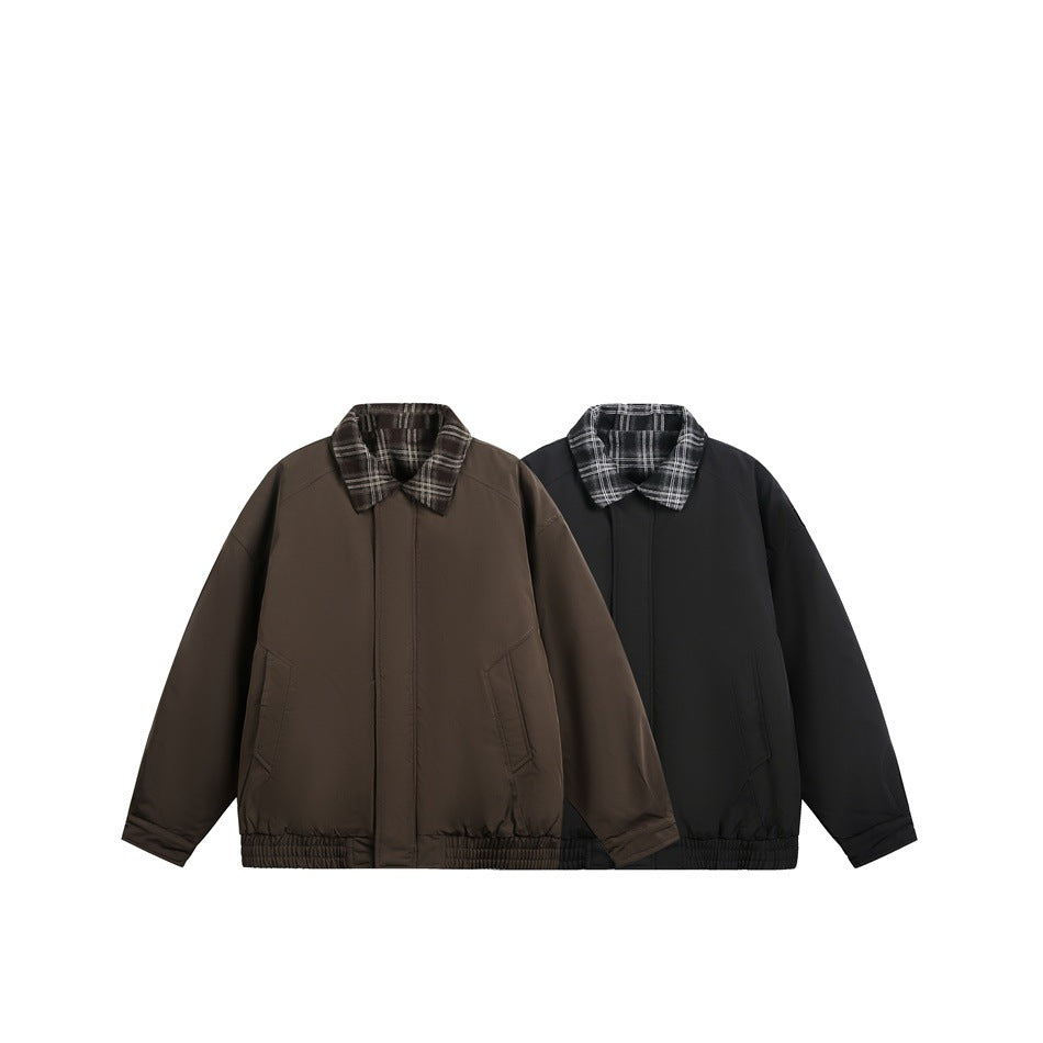 Front view of two jackets, one brown and one black, each with a contrasting plaid collar and elastic hem.