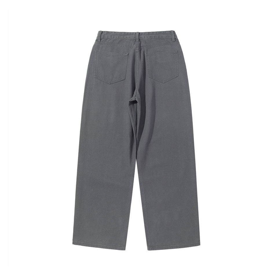 Back view of charcoal gray loose straight-leg pants with belt loops and two patch pockets.