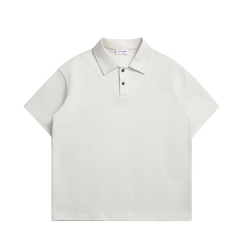 Off-white short-sleeve polo shirt with two-button placket, flat lay front view