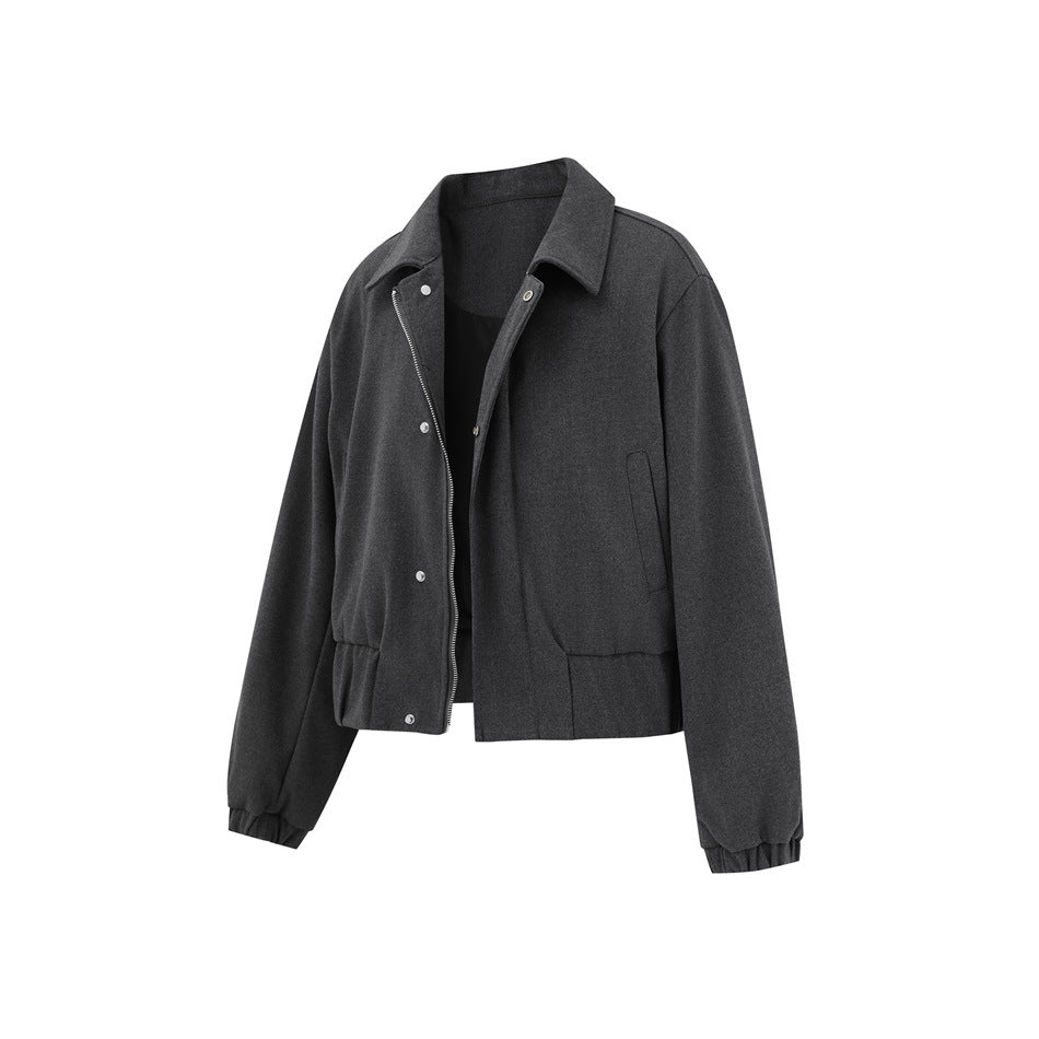 Dark gray cropped jacket shown partly unzipped, with metal zipper, snap buttons, collar and elastic cuffs