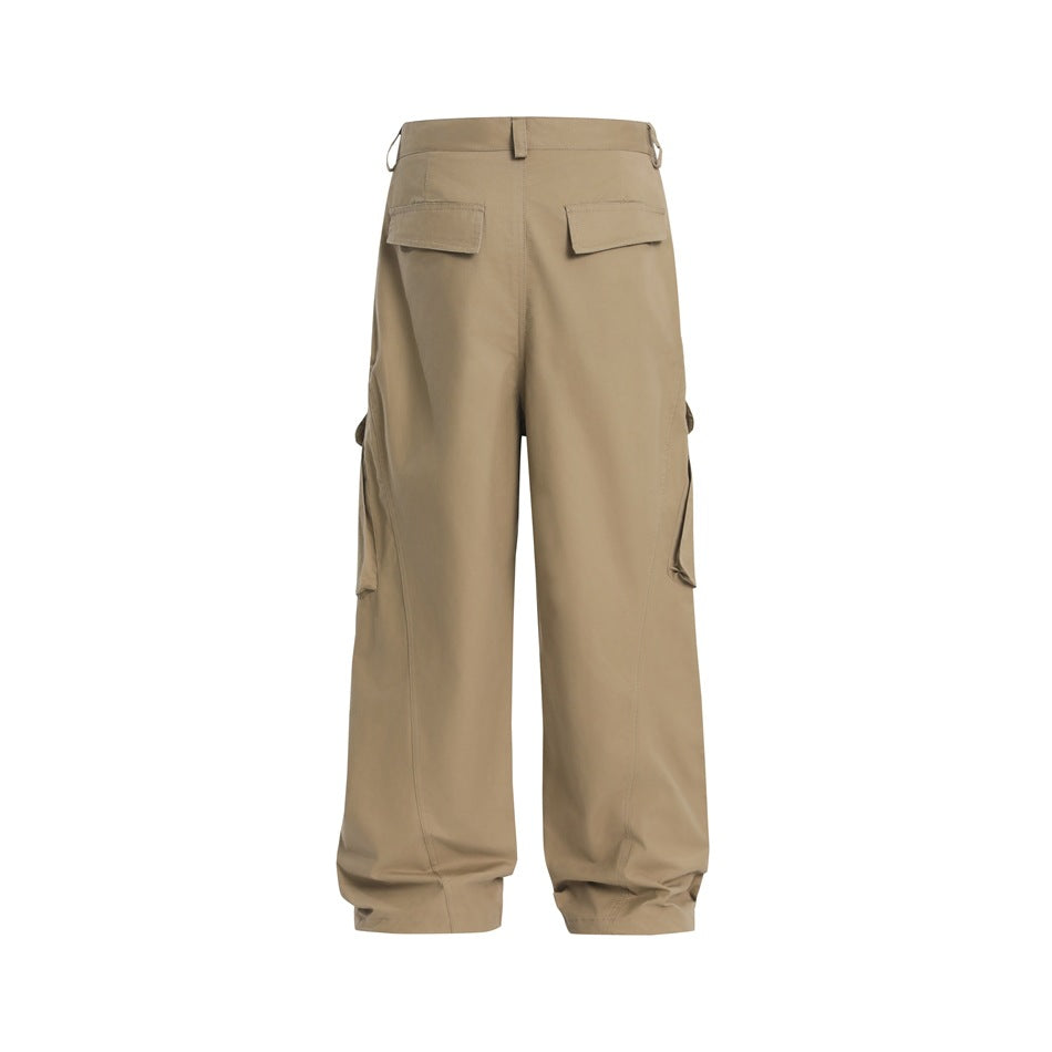 Back view of loose tan cargo trousers with flap rear pockets, side cargo pockets and wide legs.
