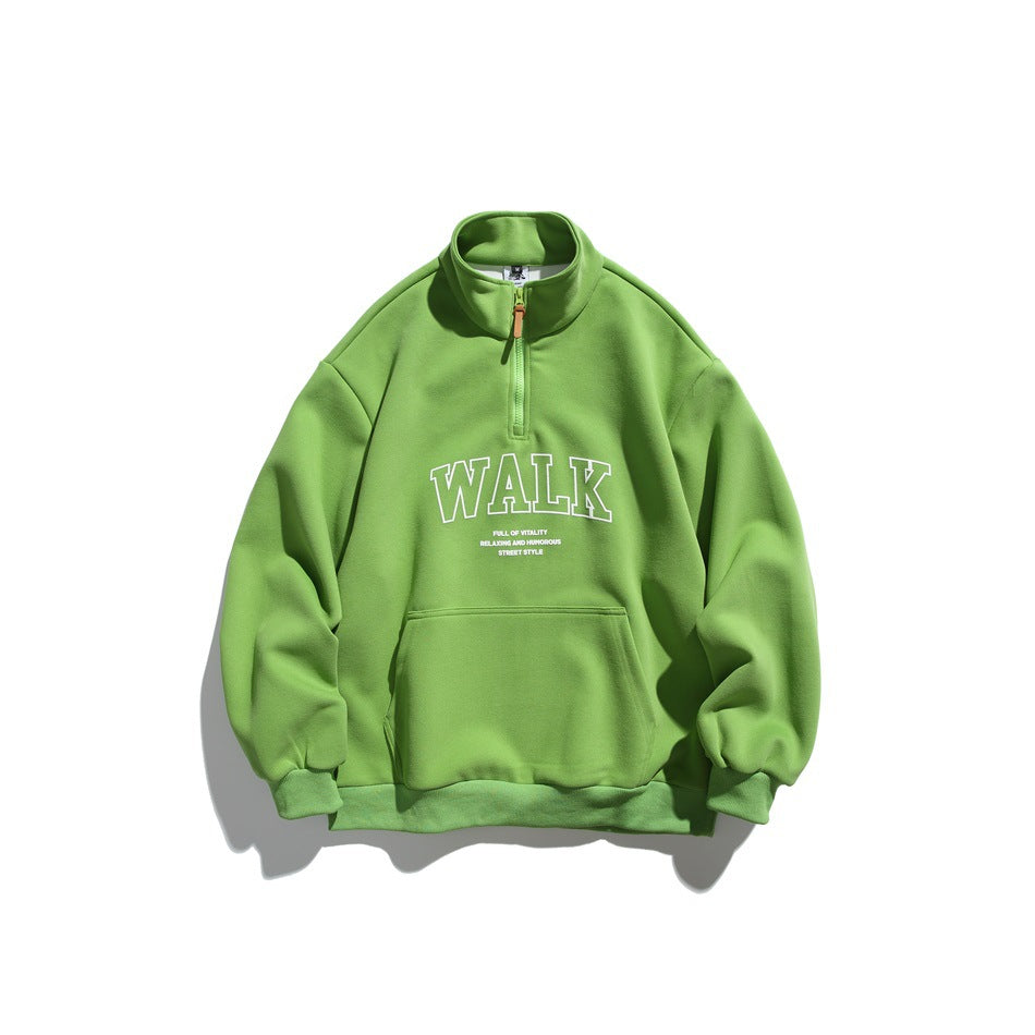 Apple green half-zip stand-collar sweatshirt with white outlined WALK print and front pouch pocket