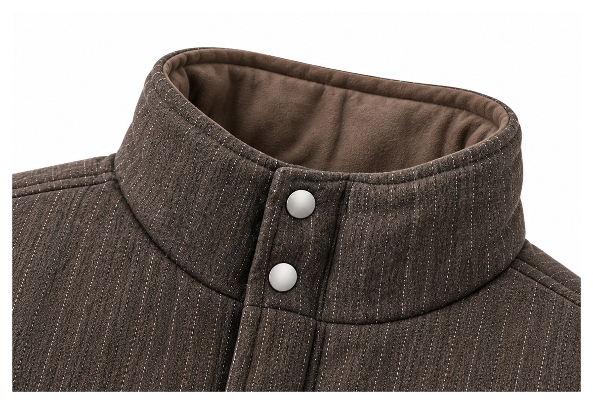 Close-up of the brown pinstripe jacket's high collar, snap placket and soft-looking inner collar.