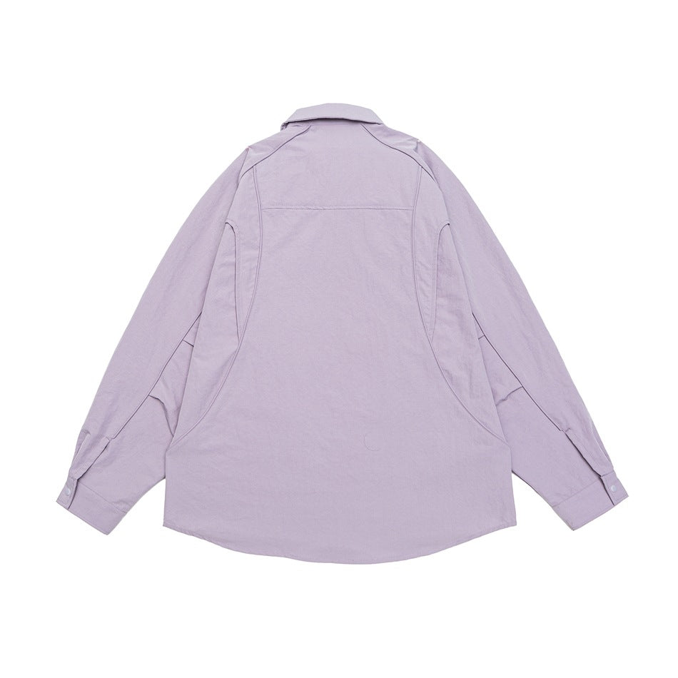 Back view of a pale lavender long-sleeve shirt laid flat, showing curved seams and a rounded hem.