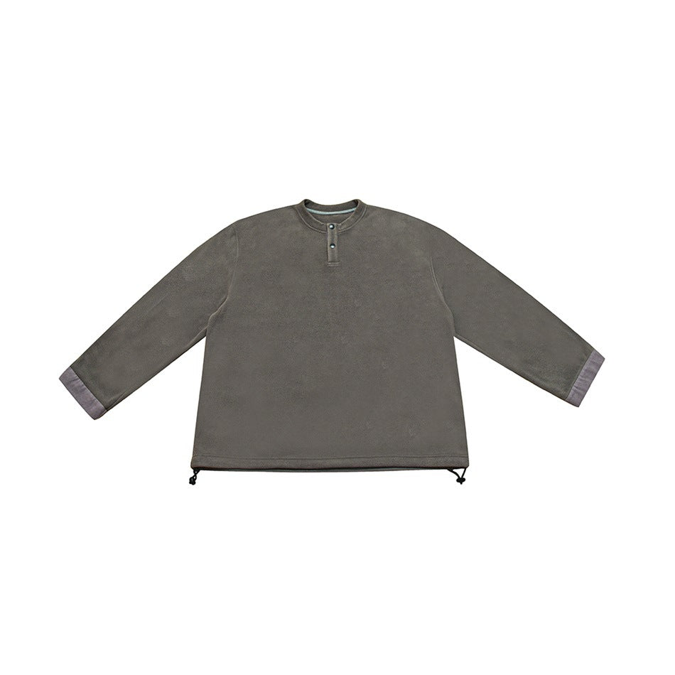Gray fleece-like long-sleeve pullover flat lay with snap henley placket, contrast cuffs and drawcord hem