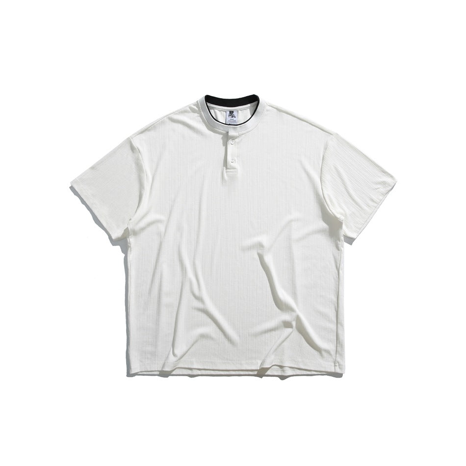 White short-sleeve henley T-shirt with two buttons, black contrast collar trim and ribbed texture, flat lay front view