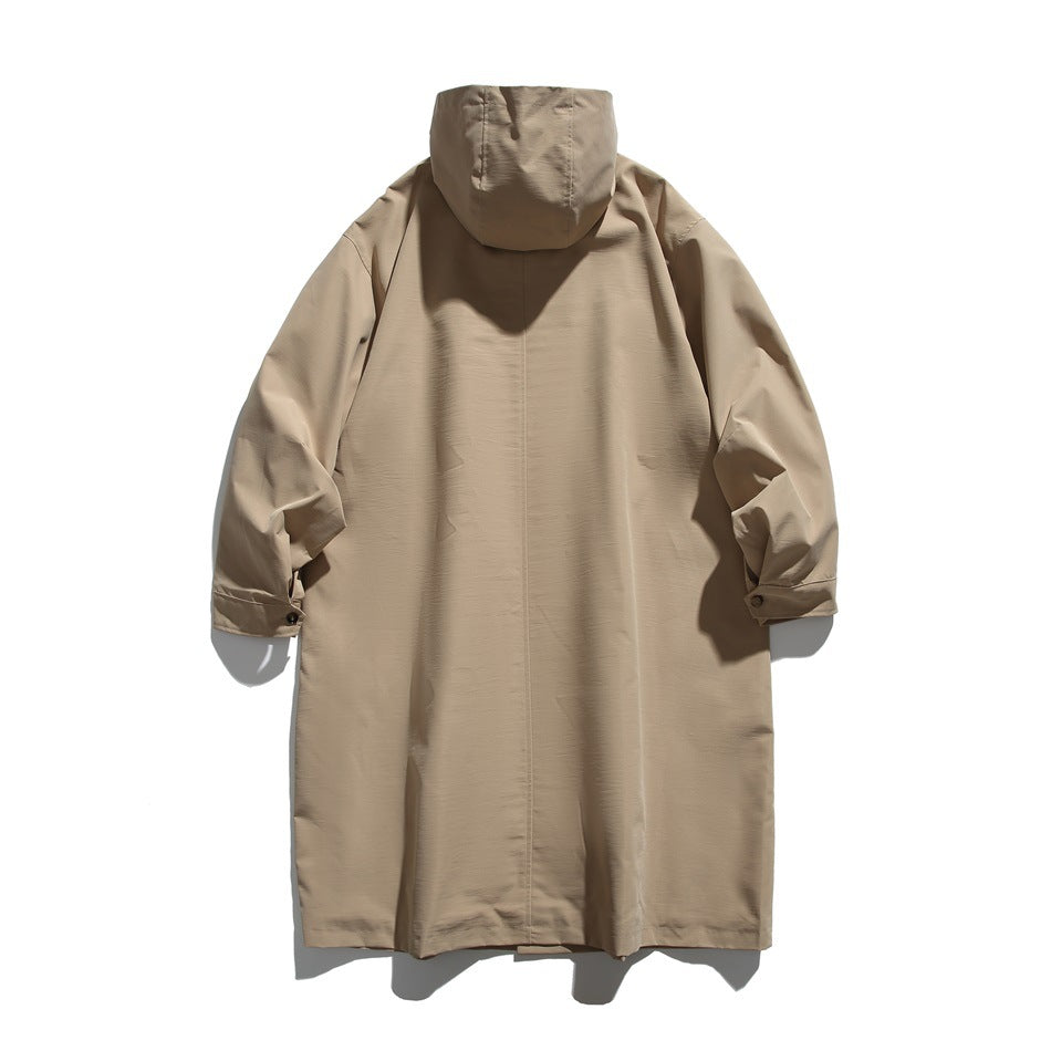 Long beige hooded coat shown from the back, with buttoned cuffs.