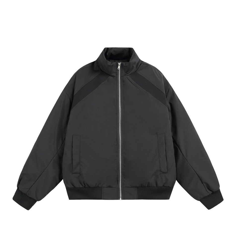 Black stand-collar zip jacket with ribbed shoulder panels, cuffs and hem, front view on white background