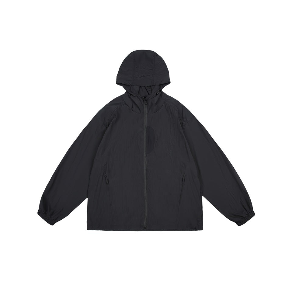 Black hooded zip jacket flat lay with side zip pockets, elastic cuffs and a chest panel