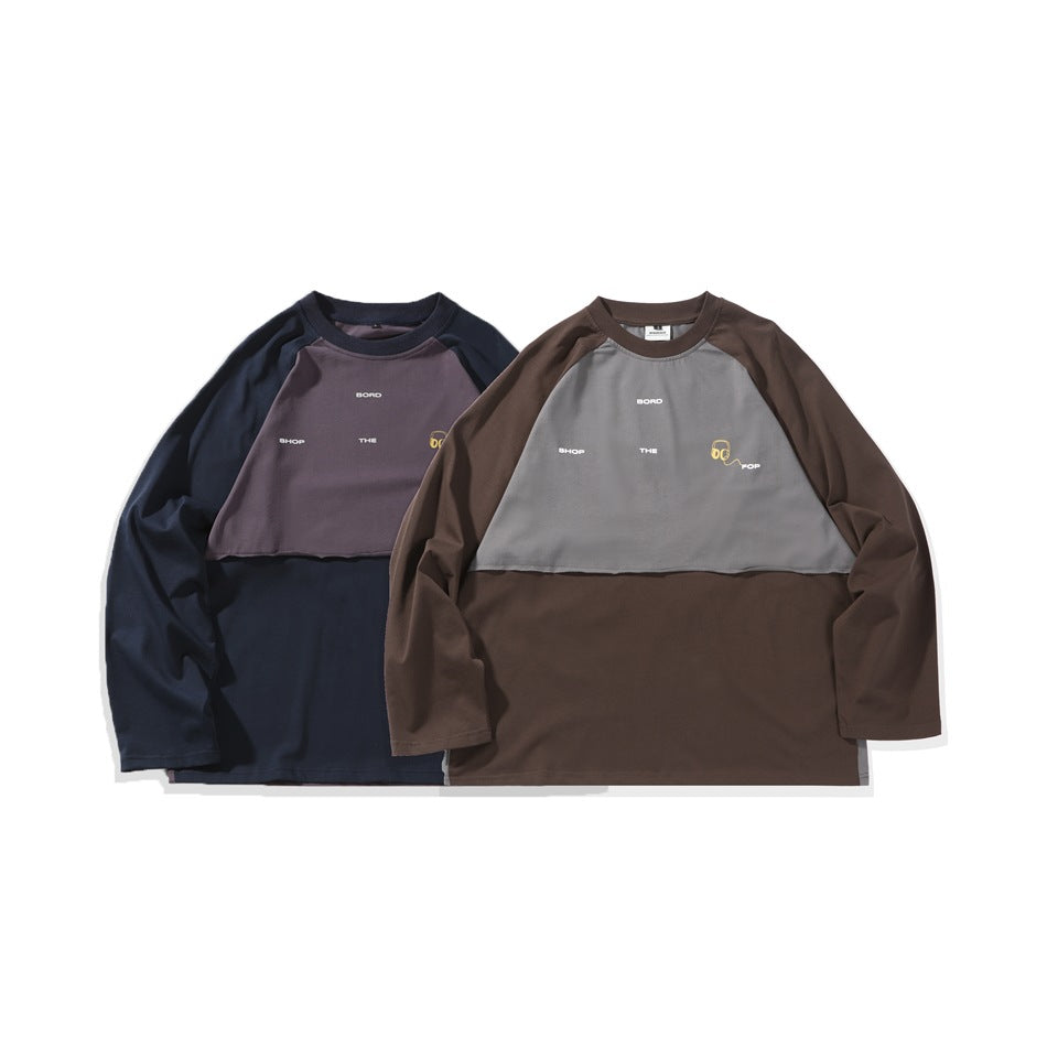 Two raglan sweatshirts displayed together: one navy with a muted purple chest panel, and one brown with a gray panel.