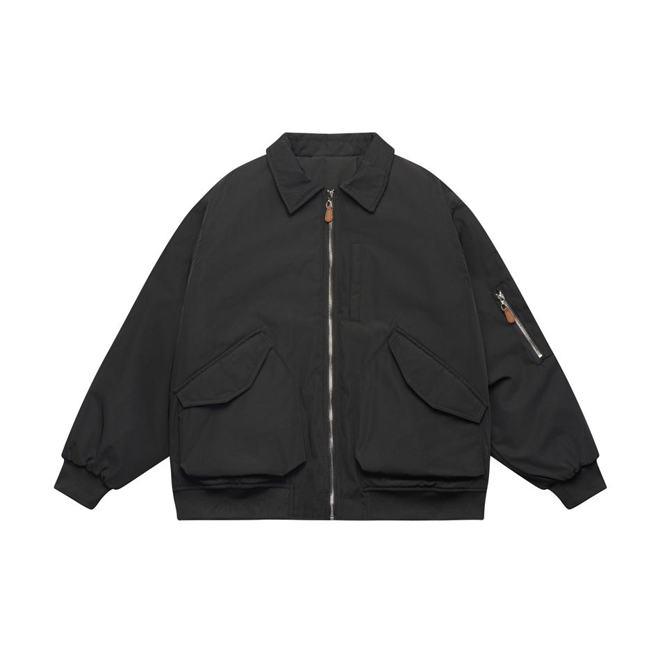 Black padded bomber jacket with pointed collar, front zip, flap pockets and ribbed cuffs, flat front view