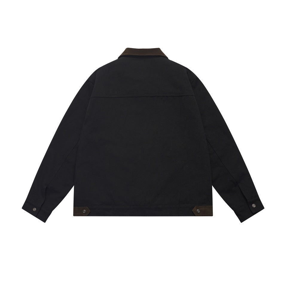 Back view of a black jacket with a brown collar and brown buttoned tabs at the hem.