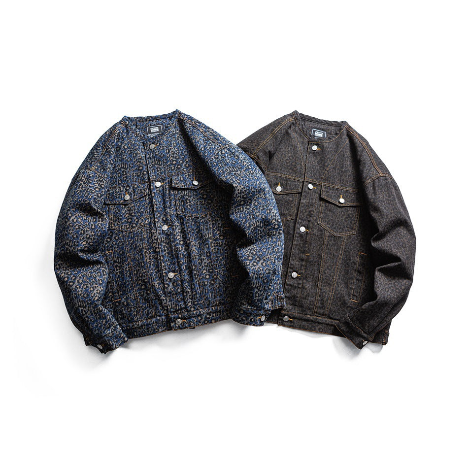 Two button-front leopard-print denim jackets shown from the front: one blue and one dark charcoal.