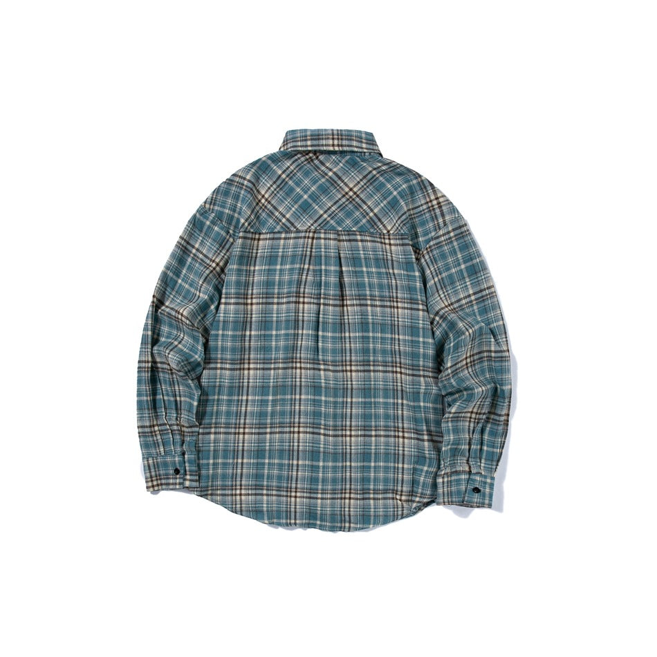Back view of lake blue plaid long-sleeve shirt with back yoke, center pleat and buttoned cuffs, laid flat